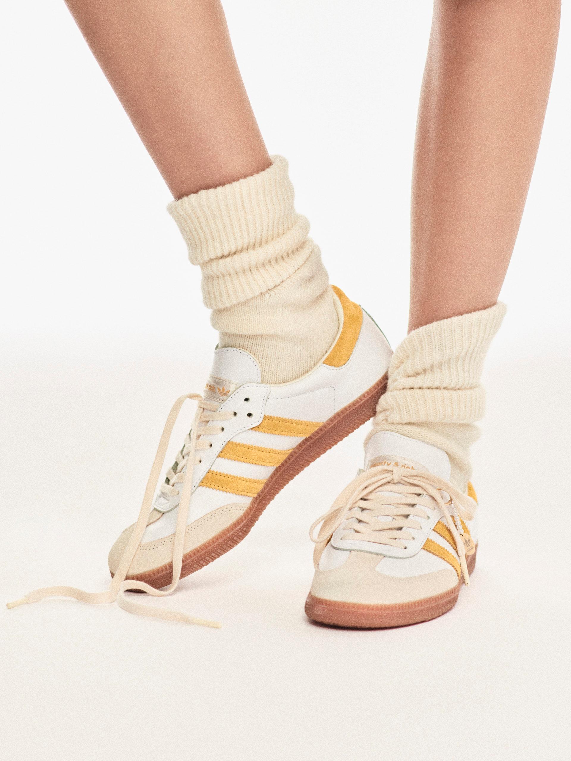 Sporty & Rich x adidas Samba 'White Bold Gold' on feet